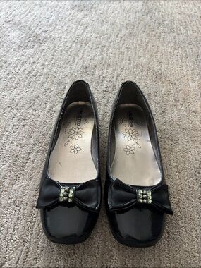 Unlisted Black Patent Bow Flats with Rhinestone Accent